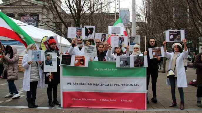 iran-political-prisoner-protests-shackled-hospital-transfer