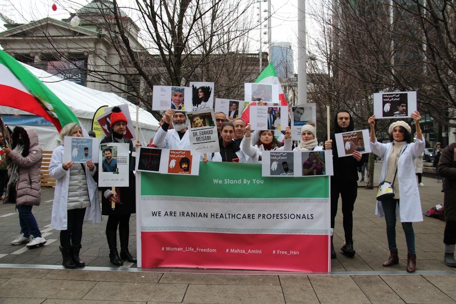 iran-political-prisoner-protests-shackled-hospital-transfer