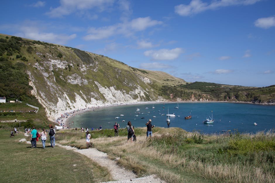 Migrants arriving on the English coast in small boats